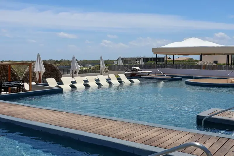 Luxury resort pool symbolizing travel rewards